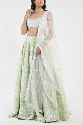 Ivory and green lehenga set